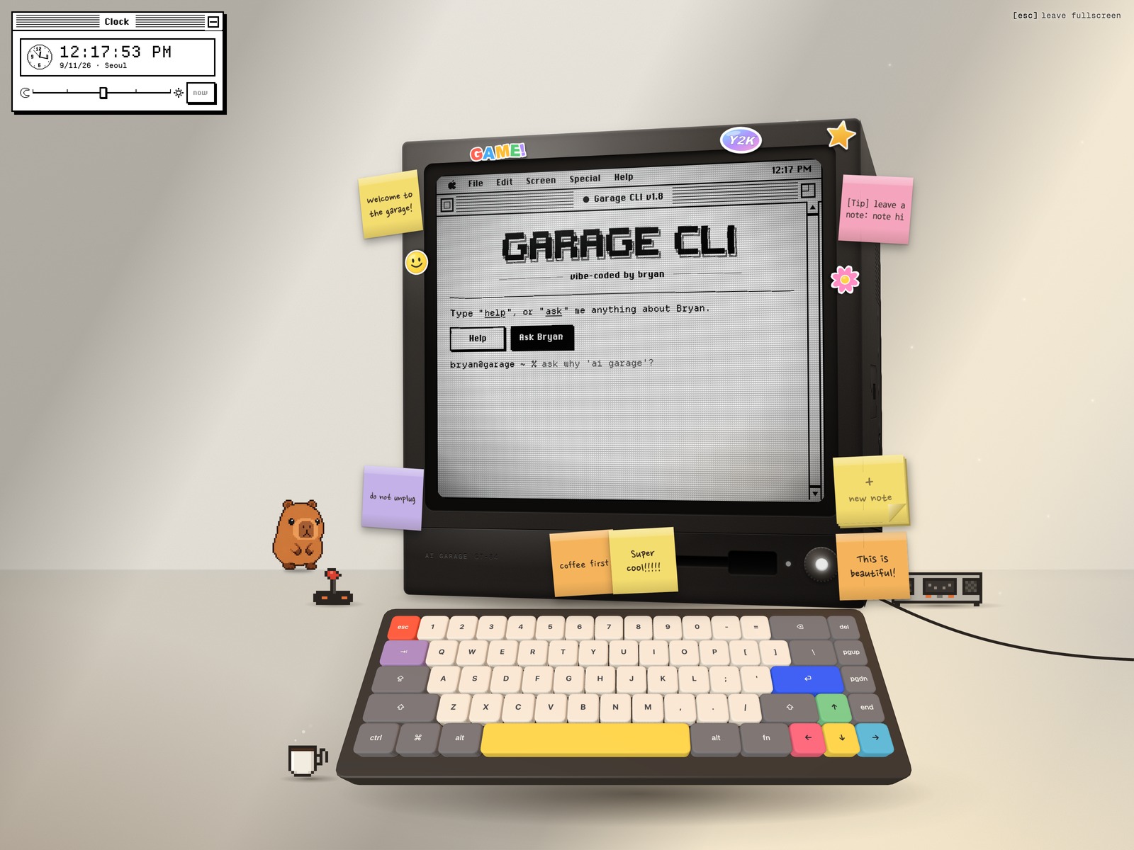 The Mac room: desk, WebGL keyboard, clock