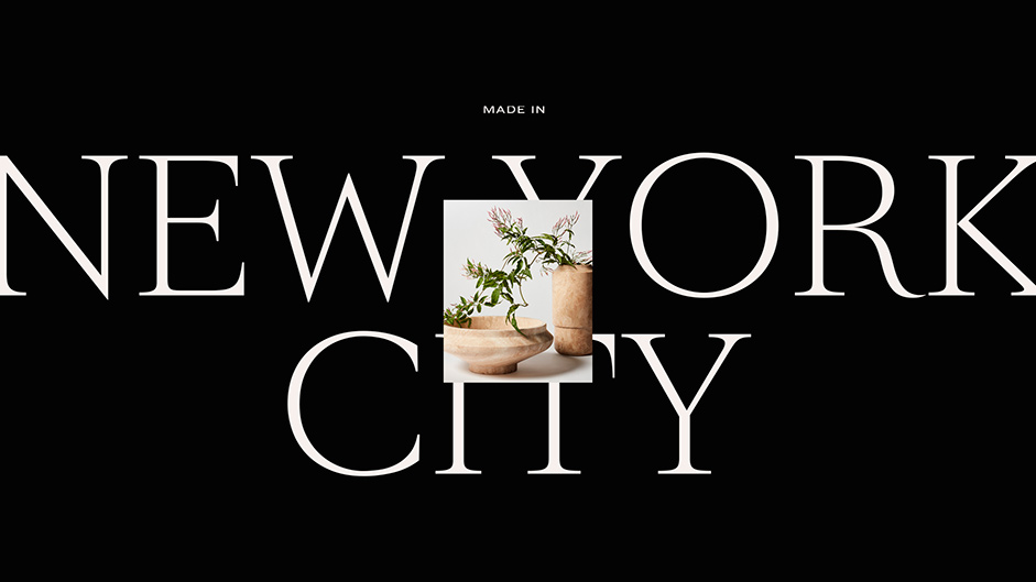 View of the Footer: taxt saying “Made in New York City” with a plant in ceramic plantpot hovering above it